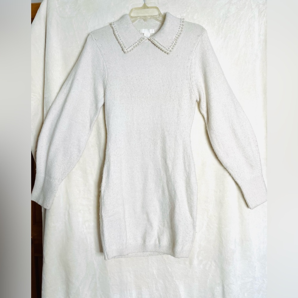 White SMALL long sleeve dress. Sweater material. Collar with pearls around it.